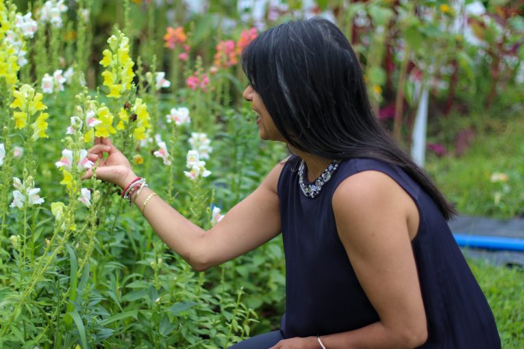 MP Bardish Chagger enjoying the beautiful flowers at Our Farm.