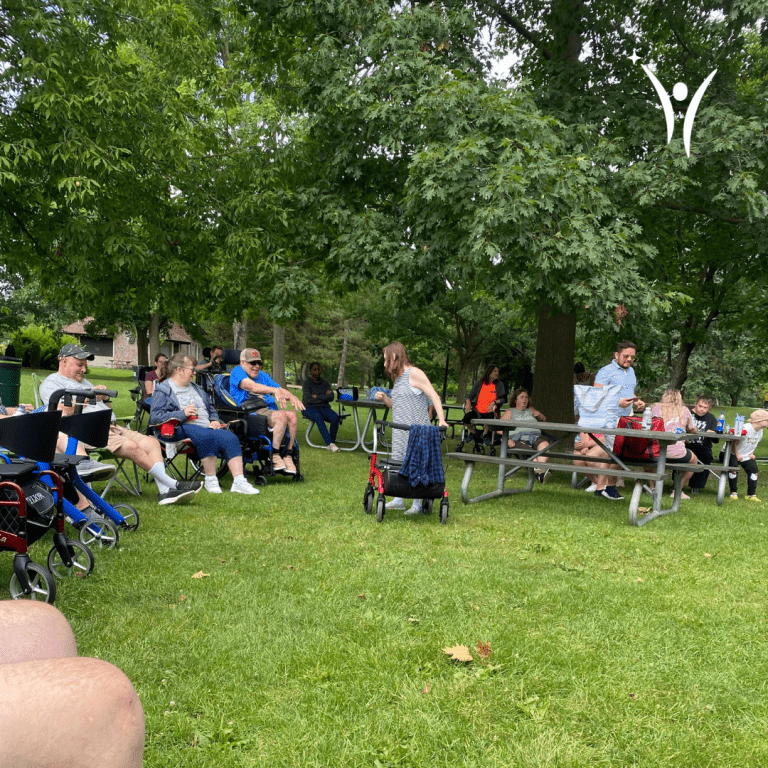 People dancing, singing, and enjoying the bring along sing along event in the park!