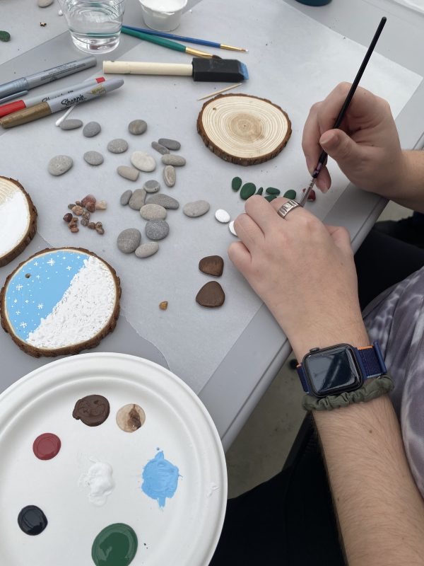 LEG Up! hosting a workshop on wood round and stone ornaments at the Colour Paradise Greenhouse.