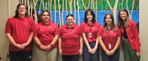 Project SEARCH interns with skills trainer and instructor at Cambridge Memorial Hospital.