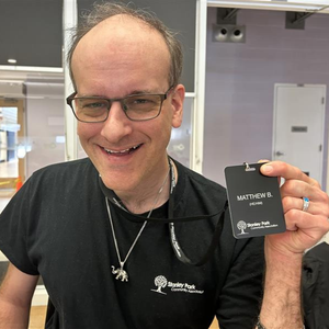 Matt holding up his name card