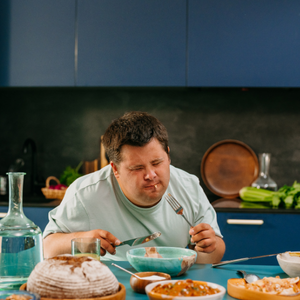 A person enjoying eating delicious food.