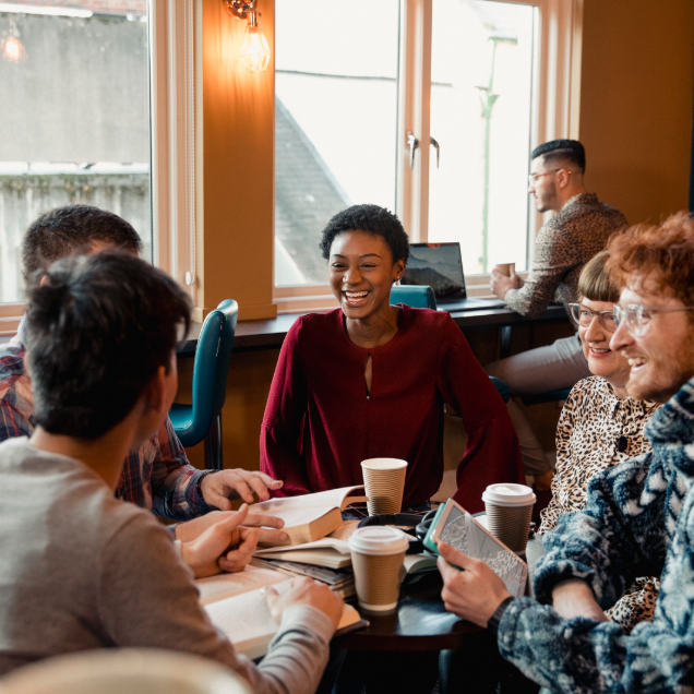 A group of people having coffee together