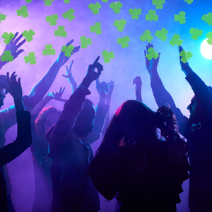 People dancing and shamrocks falling