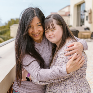 Two friends hugging