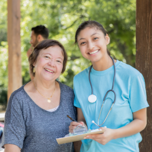 A doctor and a patient smiling