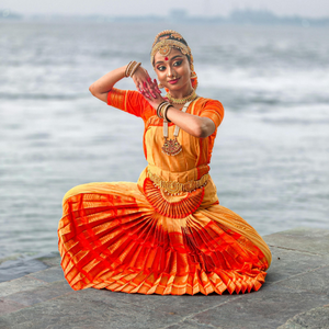 A person performing the classical Indian Dance style of Bharatnatyam