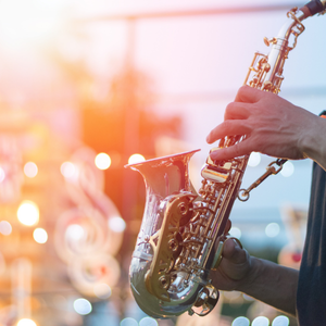 A person playing a saxophone.