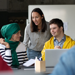 Three people having a conversation.