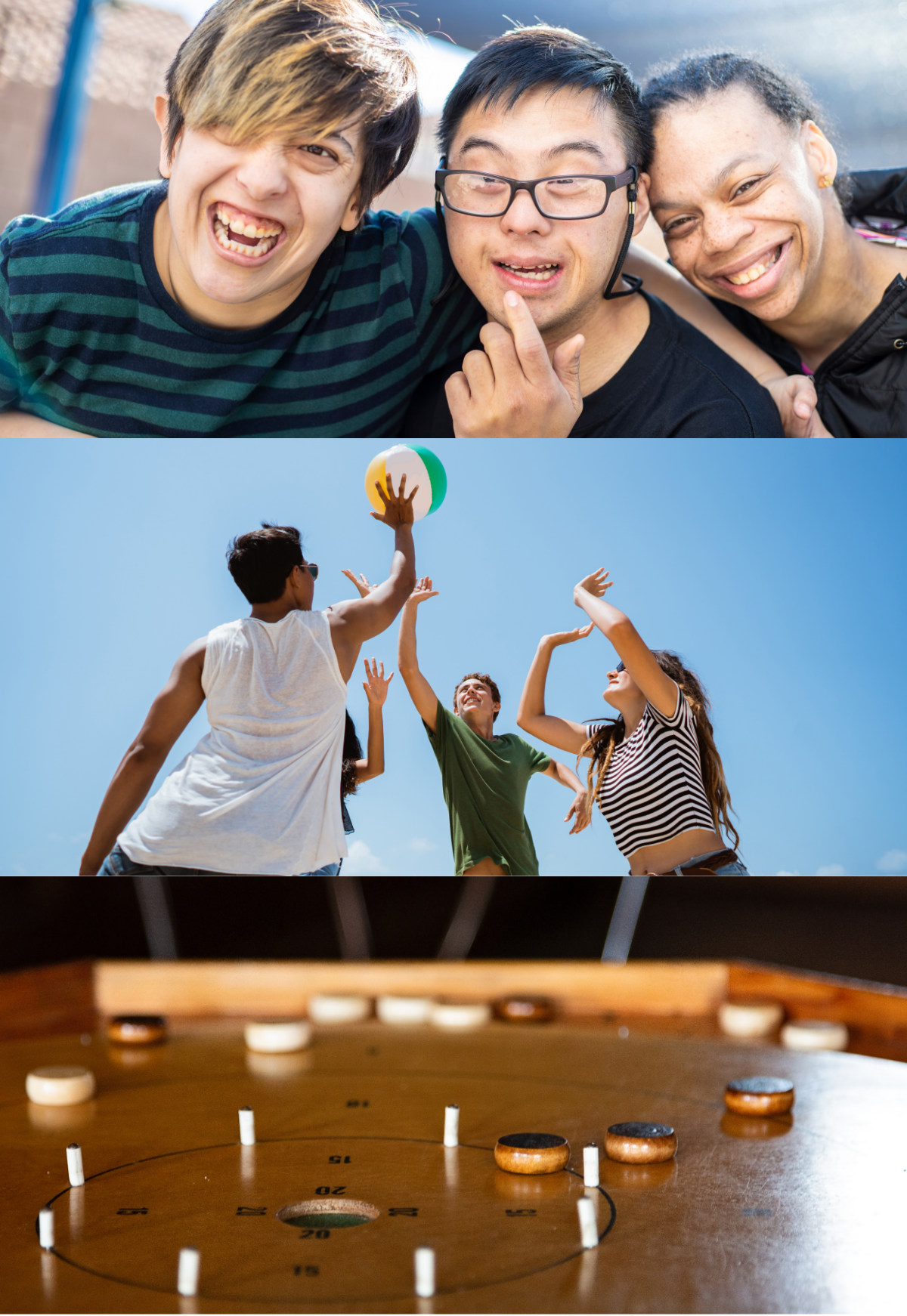A group of friends smiling and having fun. A group of people all trying to keep a ball up in the air. A crokinole board with pieces on it.