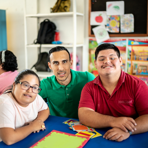 Three people playing a game together