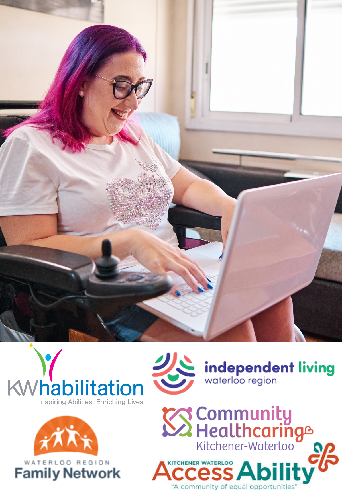 A person in a wheelchair using a laptop computer.