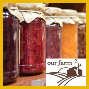 Several jars with different types of jam in them. The Our Farm Logo.