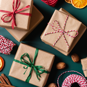 several parcels tied up with decorative strings in a bow