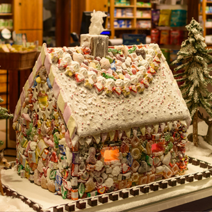 A very extravagantly decorated gingerbread house.