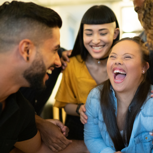 A group of people laughing hysterically.