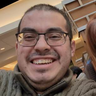 Simon's face smiling