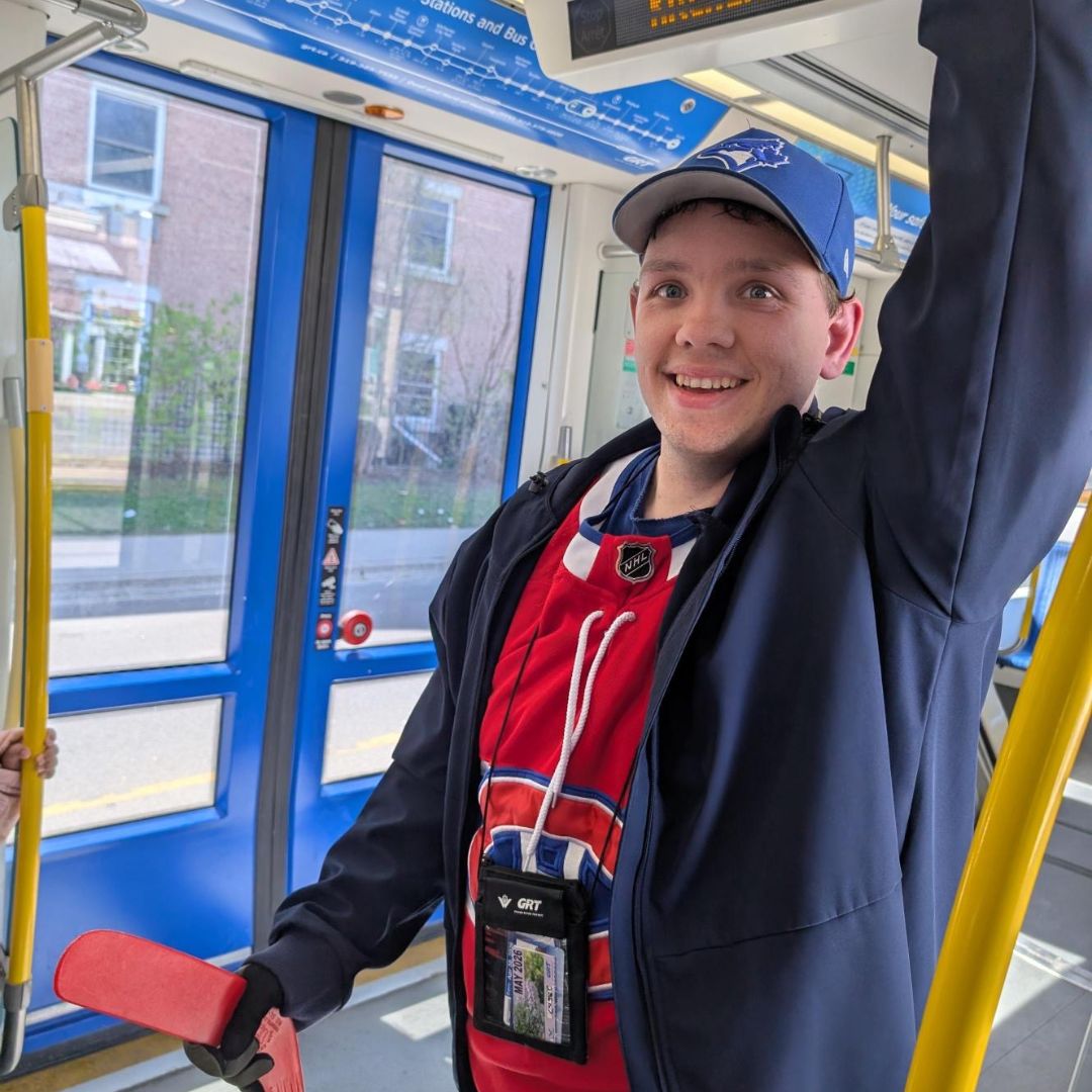 smiling man on the bus