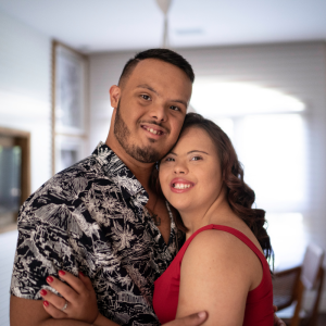 Hangout Events SHOP PHOTOS photo of two young people with Down syndrome in an embrace